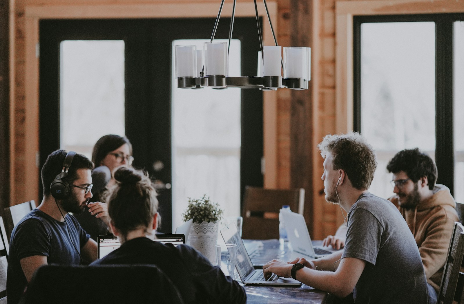 Diverse business professionals collaborating around a table