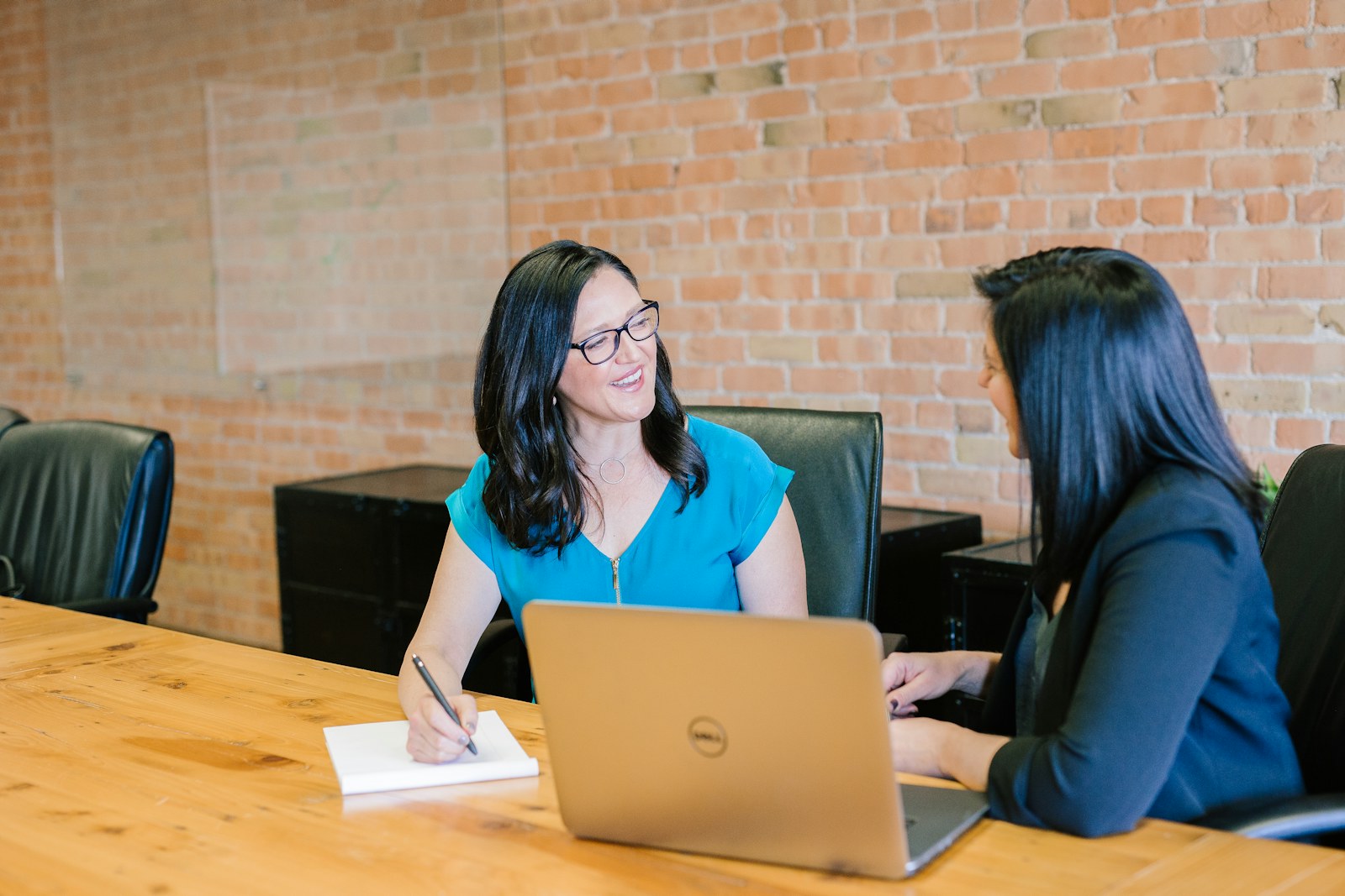 Business leaders meeting in a bright conference room